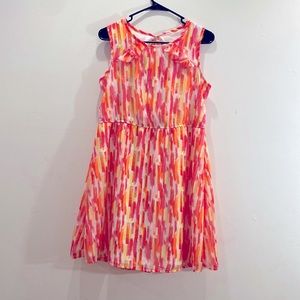 Colorful, lightweight, sleeveless, ruffled, summer dress. Fully lined.